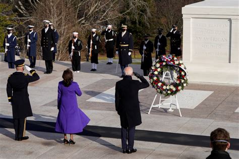 WATCH: Biden and Harris families lay wreath at Arlington .